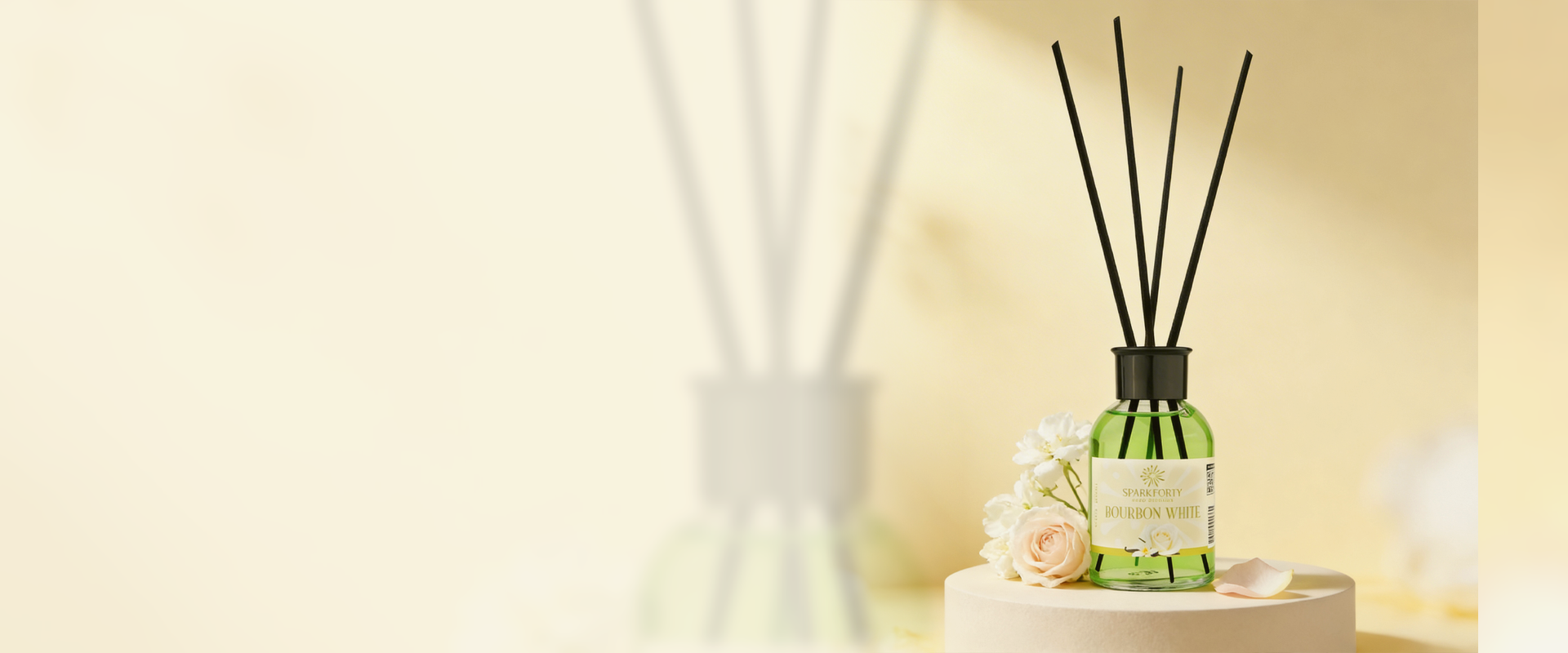 Bourbon White reed diffuser by Sparkforty displayed in a luxury home setting with soft floral accents