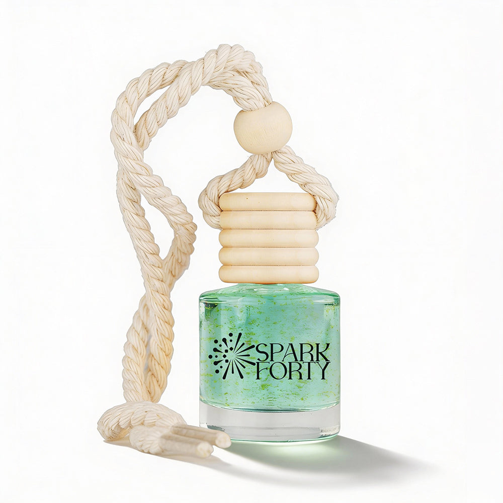 Sparkforty Jasmine car air freshener with a premium glass bottle, wooden diffuser cap, and cotton hanging rope isolated on a white background.