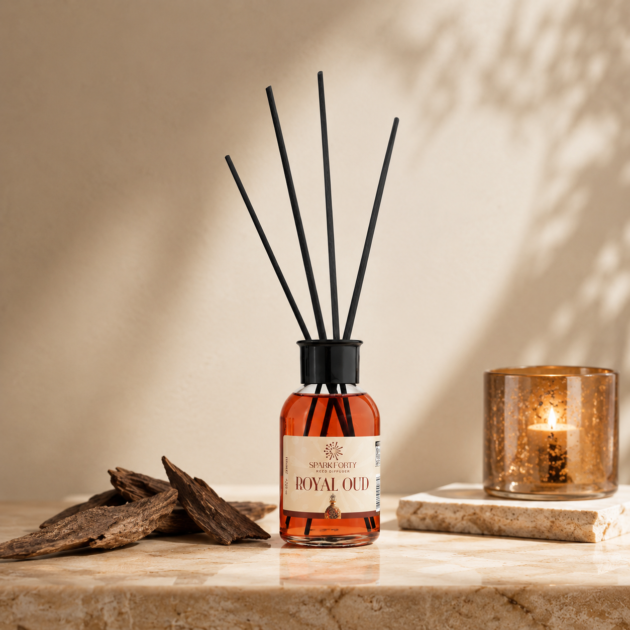 Sparkforty Royal Oud reed diffuser with premium oud fragrance displayed on a stone surface with natural wood accents